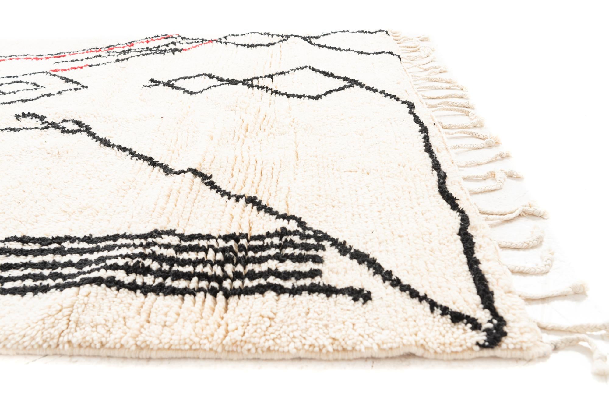 5' x 8' 8 Hand Knotted Moroccan Wool Rug