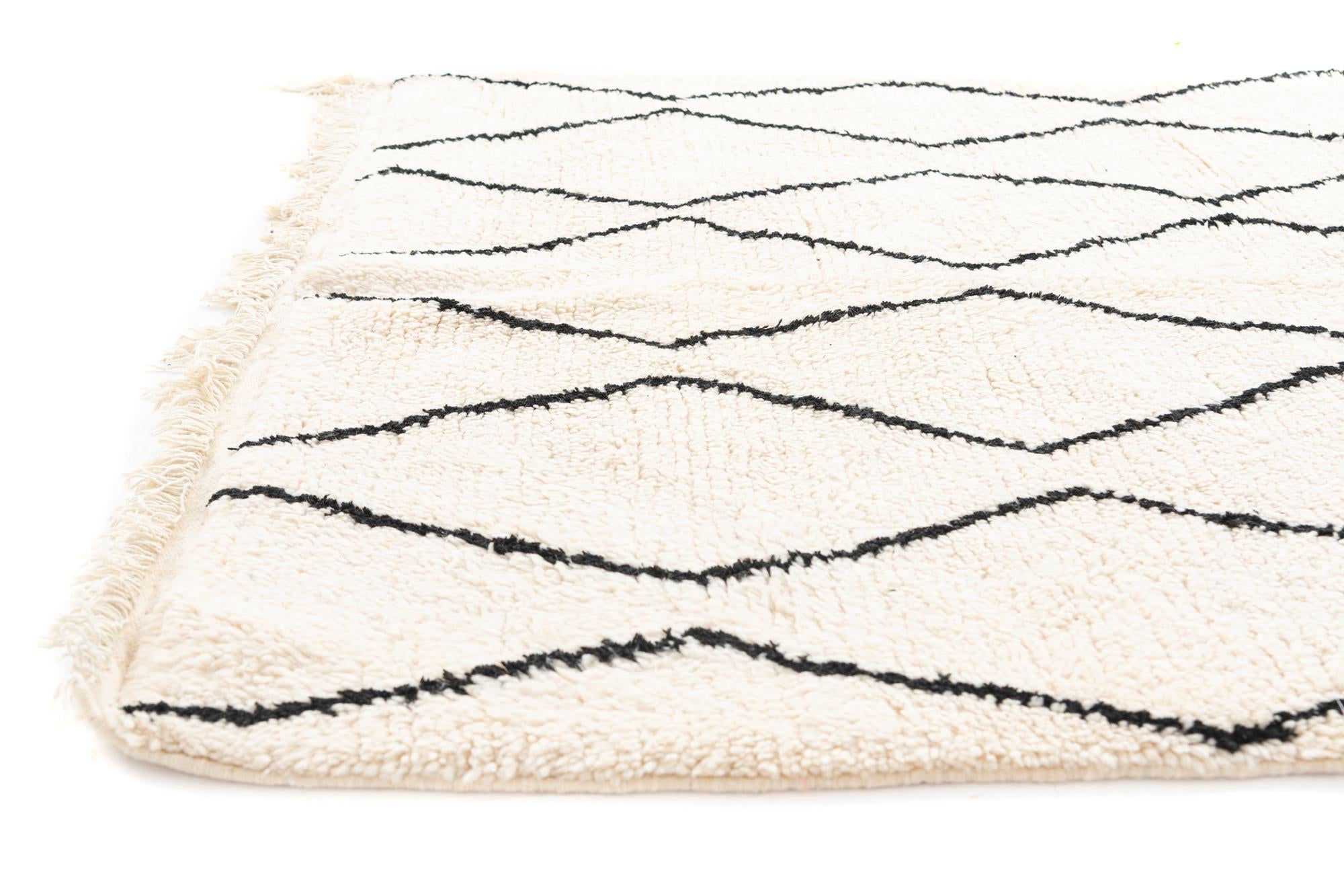 4' 9 x 8' Hand Knotted Moroccan Wool Rug