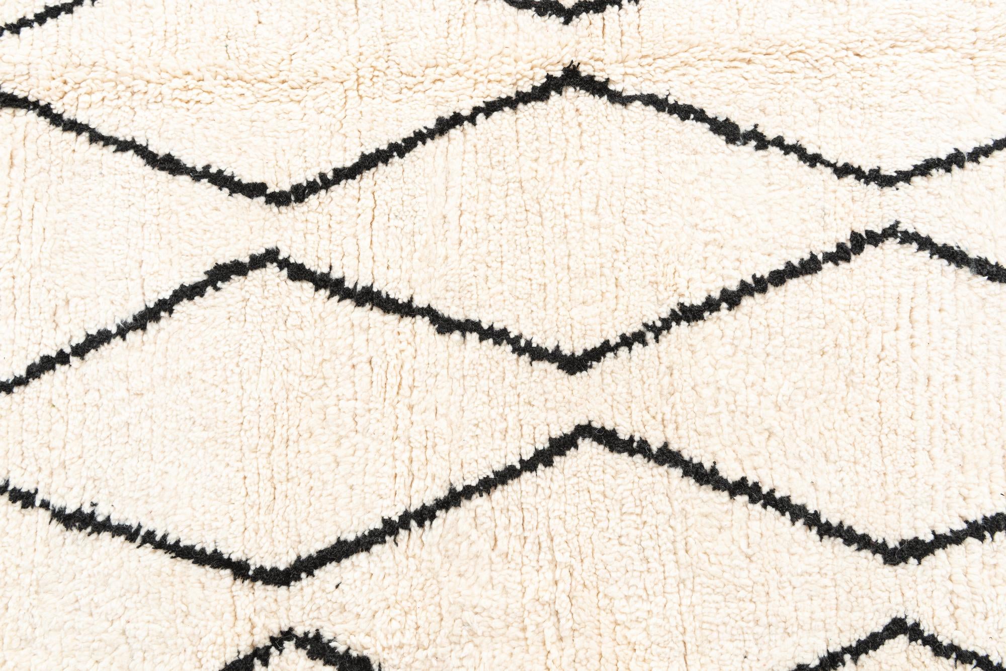 4' 9 x 8' Hand Knotted Moroccan Wool Rug