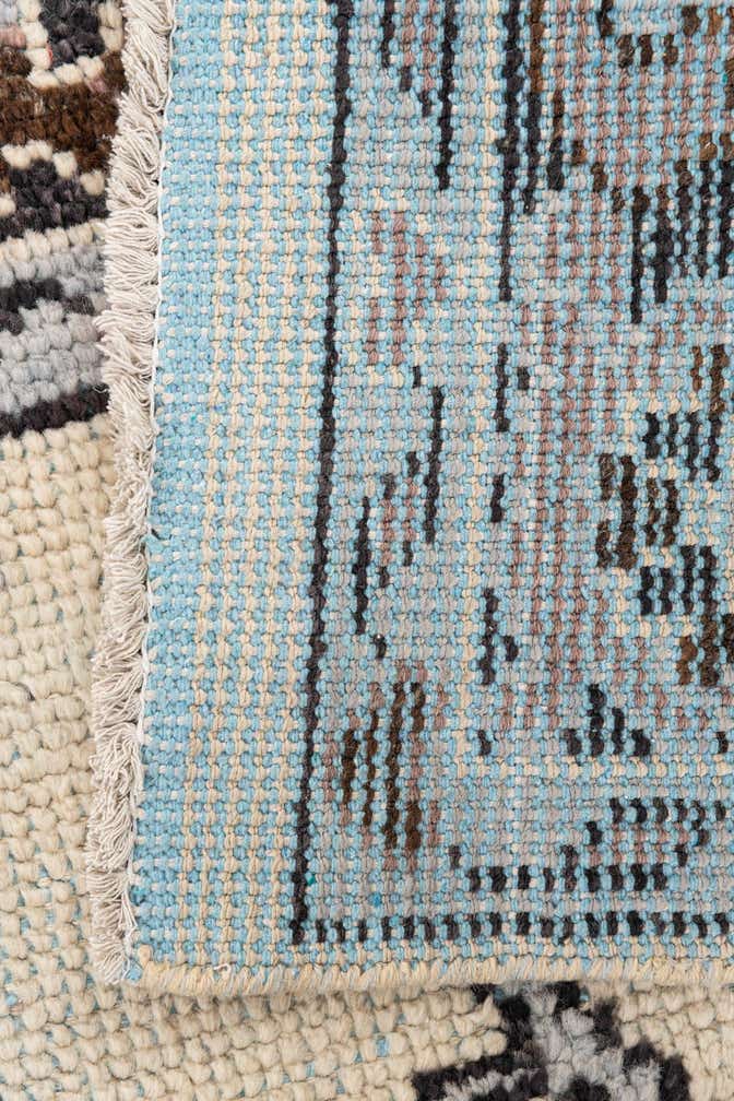 5' 10 x 9' 3 Hand Knotted Moroccan Wool Rug