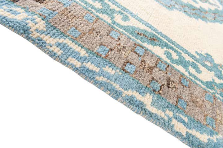 5' 5 x 9' Hand Knotted Moroccan Wool Rug