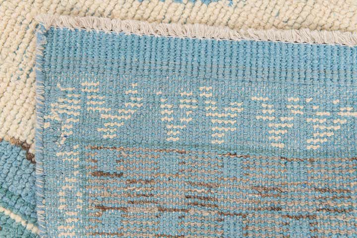 5' 5 x 9' Hand Knotted Moroccan Wool Rug