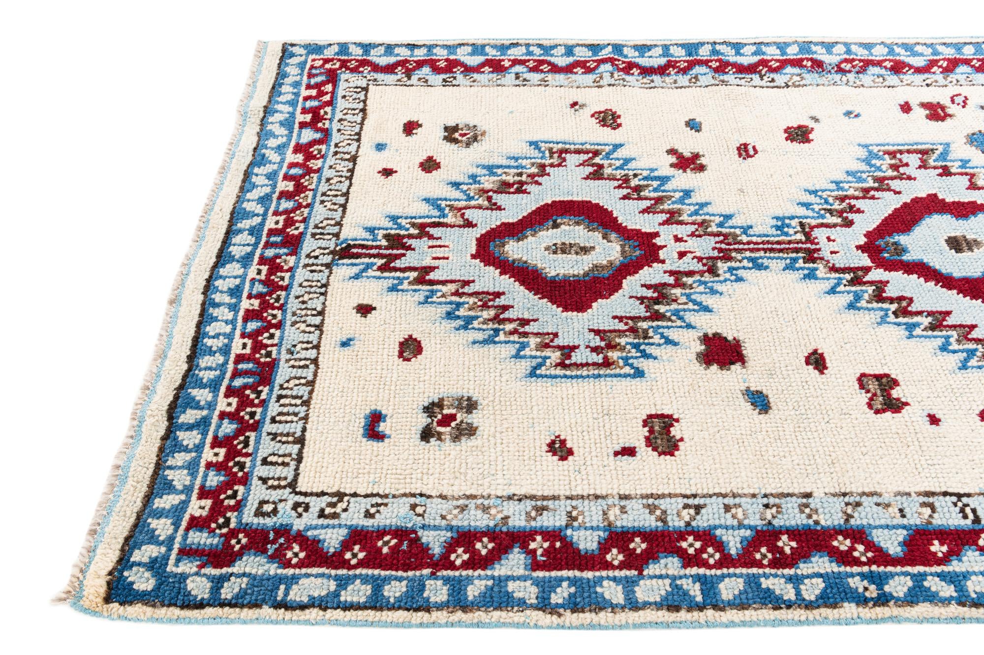 5' x 7' 6 Hand Knotted Moroccan Wool Rug