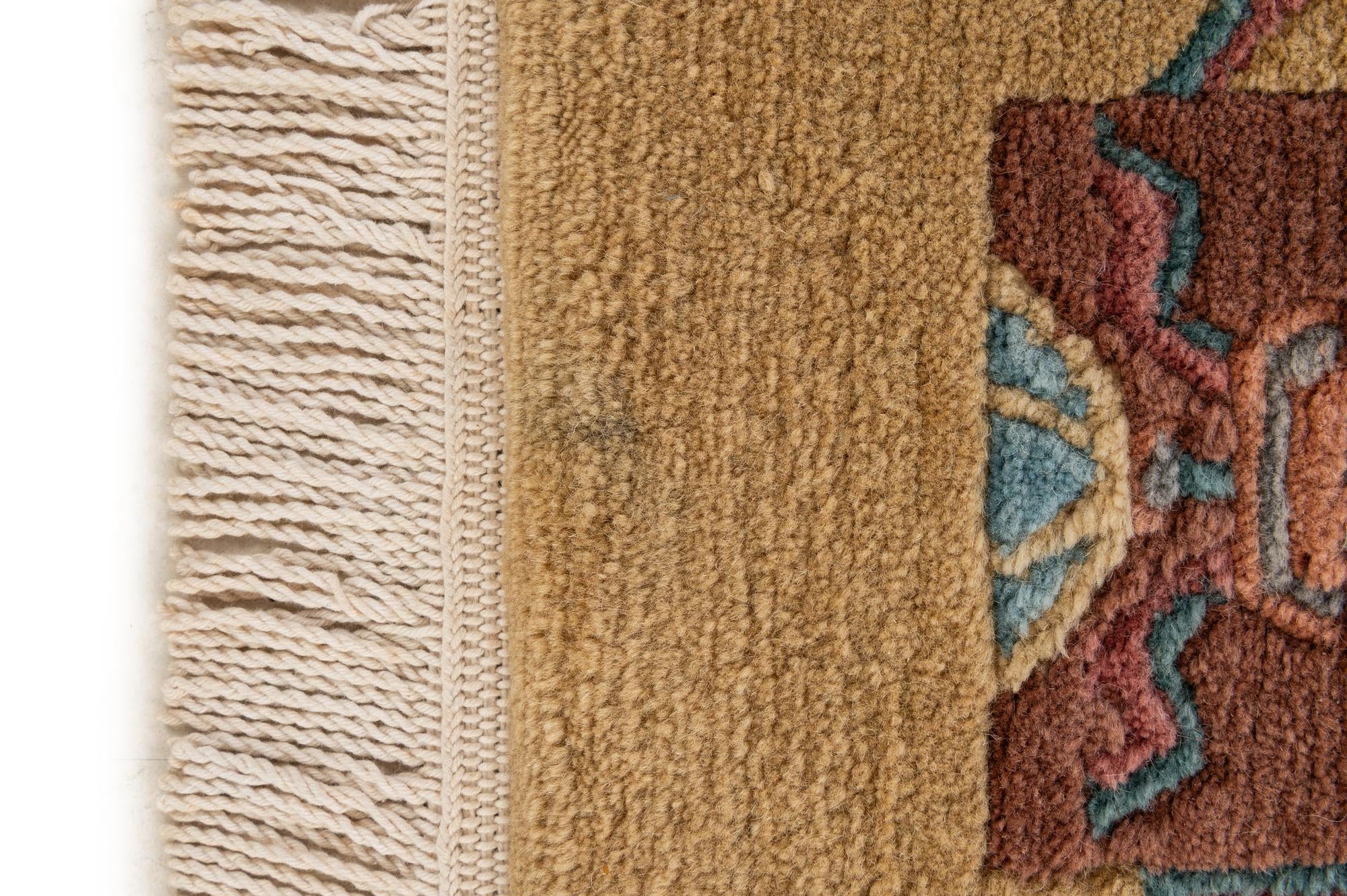 5' 9 x 8' Hand Knotted Nepal Wool Rug
