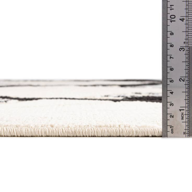 Detail image of 5' 3 x 7' 7 Easy-Clean Indoor / Outdoor Rug