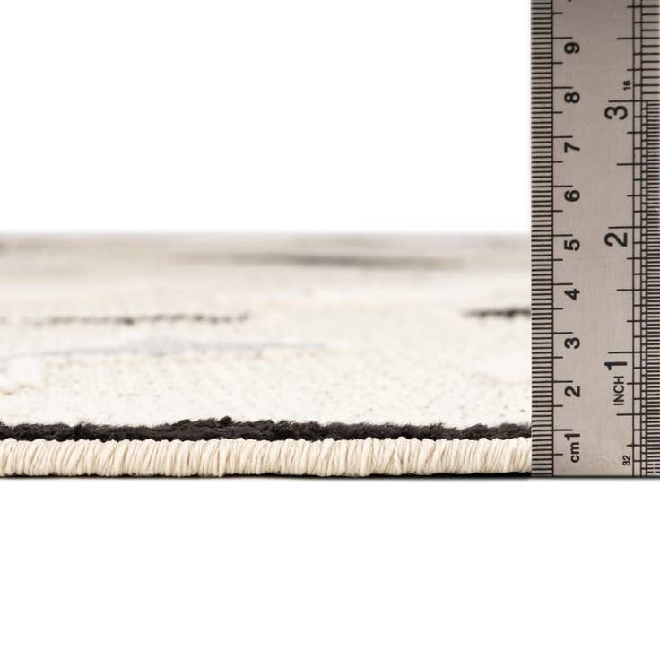 Detail image of 5' 3 x 7' 7 Easy-Clean Indoor / Outdoor Rug