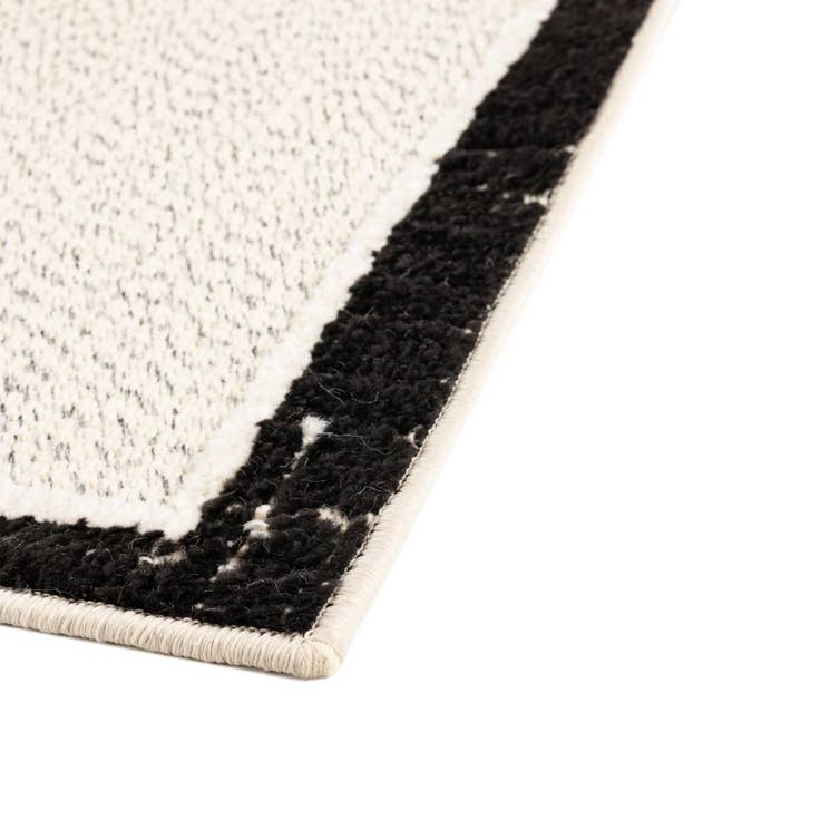 Detail image of 5' 3 x 7' 7 Easy-Clean Indoor / Outdoor Rug