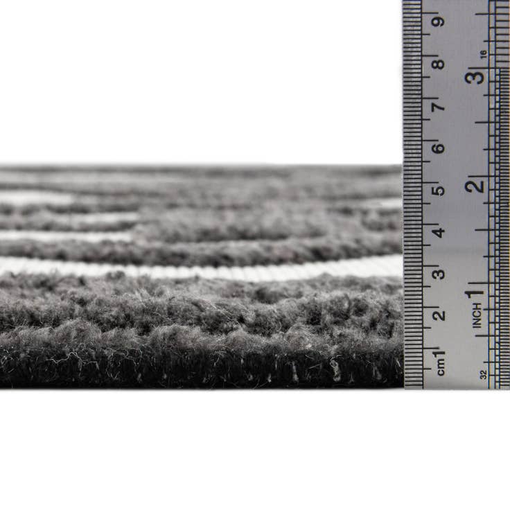 Detail image of 5' 3 x 7' 7 Easy-Clean Indoor / Outdoor Rug