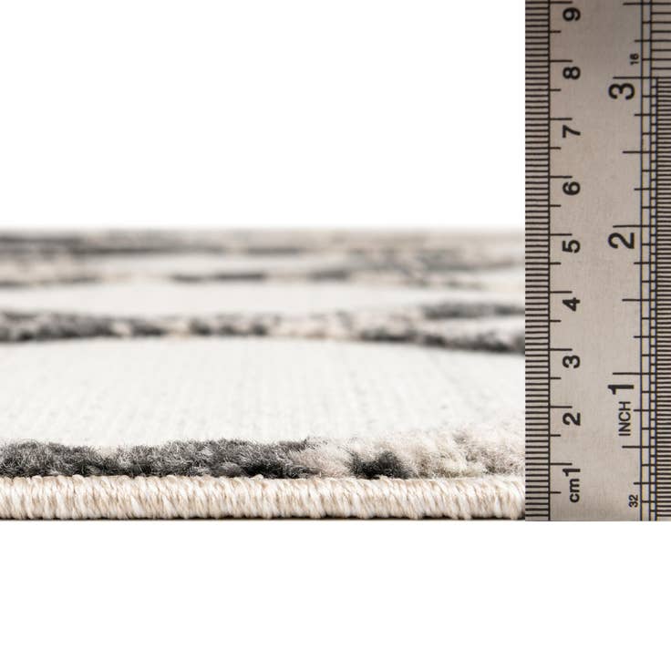Detail image of 5' 3 x 7' 7 Easy-Clean Indoor / Outdoor Rug