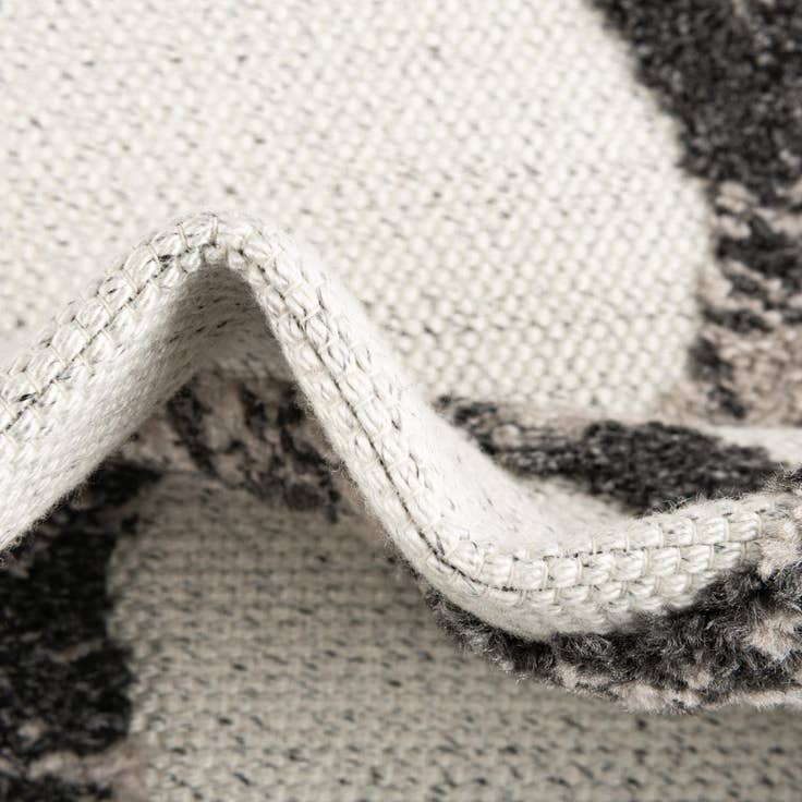 Detail image of 5' 3 x 7' 7 Easy-Clean Indoor / Outdoor Rug