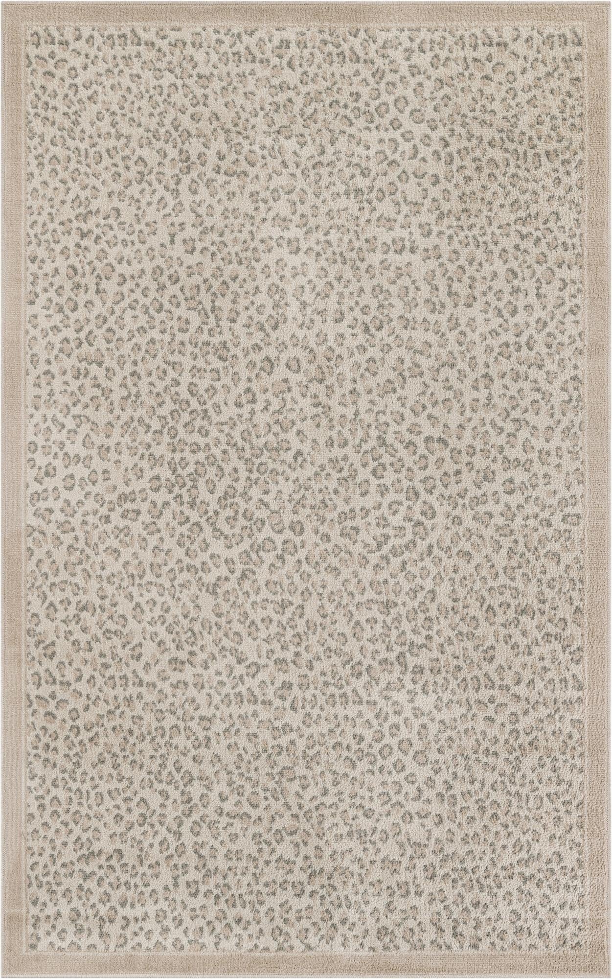A 4x6 rectangular ivory and cream modern rug with a subtle leopard spot pattern and a solid border.