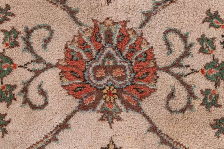 7' x 9' 8 Hand Knotted Tabriz Wool Rug