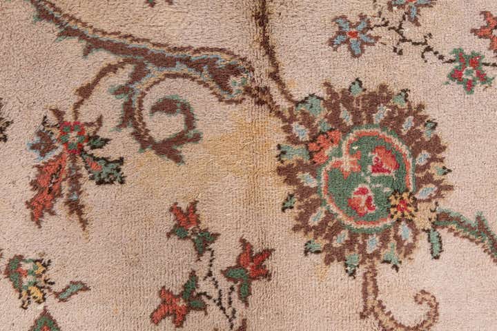7' x 9' 8 Hand Knotted Tabriz Wool Rug