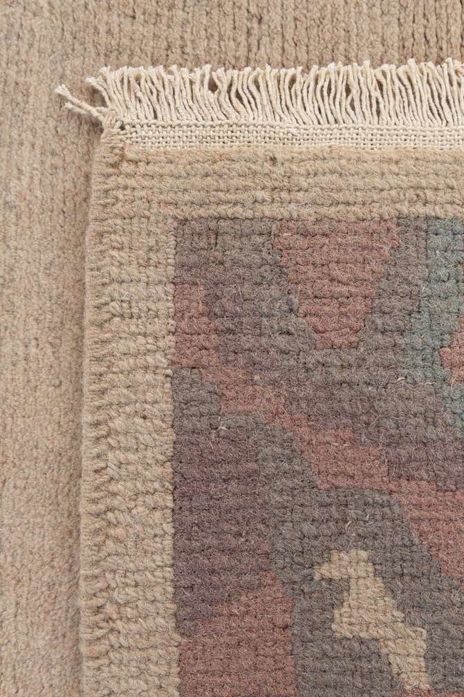 4' 2 x 5' 7 Hand Knotted Tibet Wool Rug