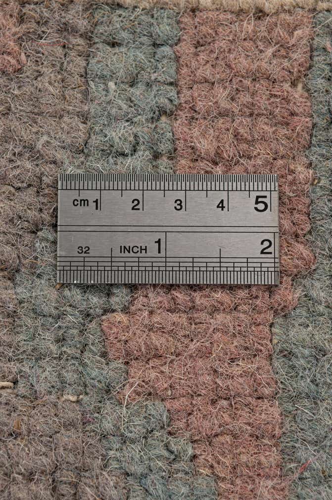 4' 2 x 5' 7 Hand Knotted Tibet Wool Rug