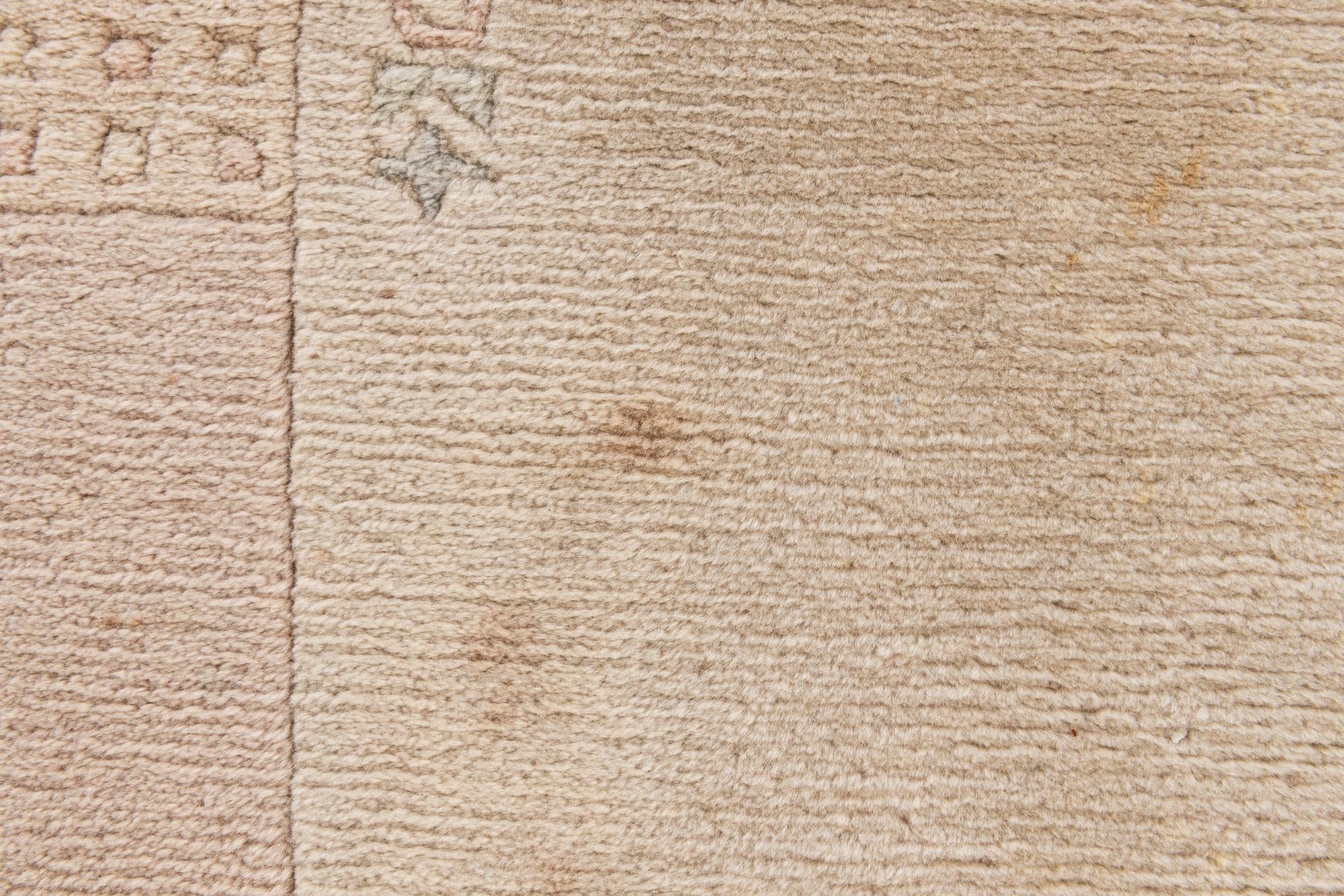 4' x 5' 9 Hand Knotted Tibet Wool Rug