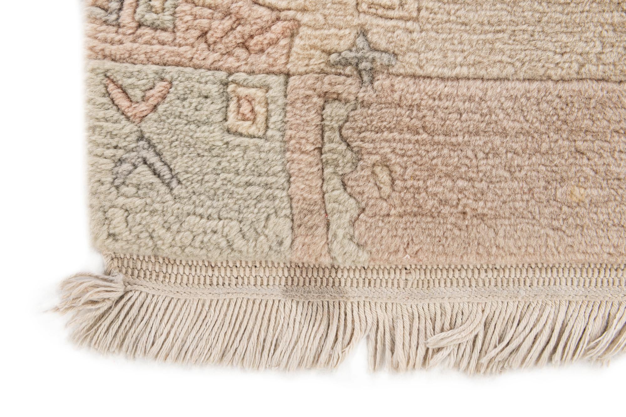 4' x 5' 9 Hand Knotted Tibet Wool Rug