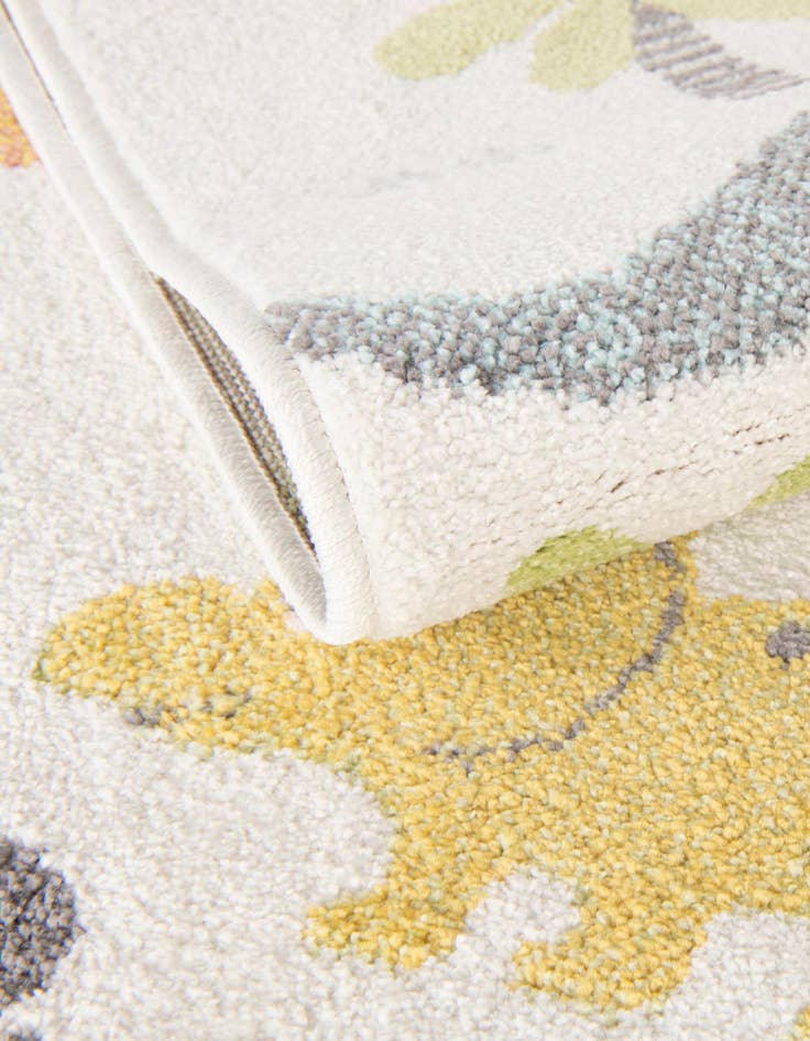 Detail image of 4' 1 x 6' 1 Dinosaur Whimsy Kids Rug