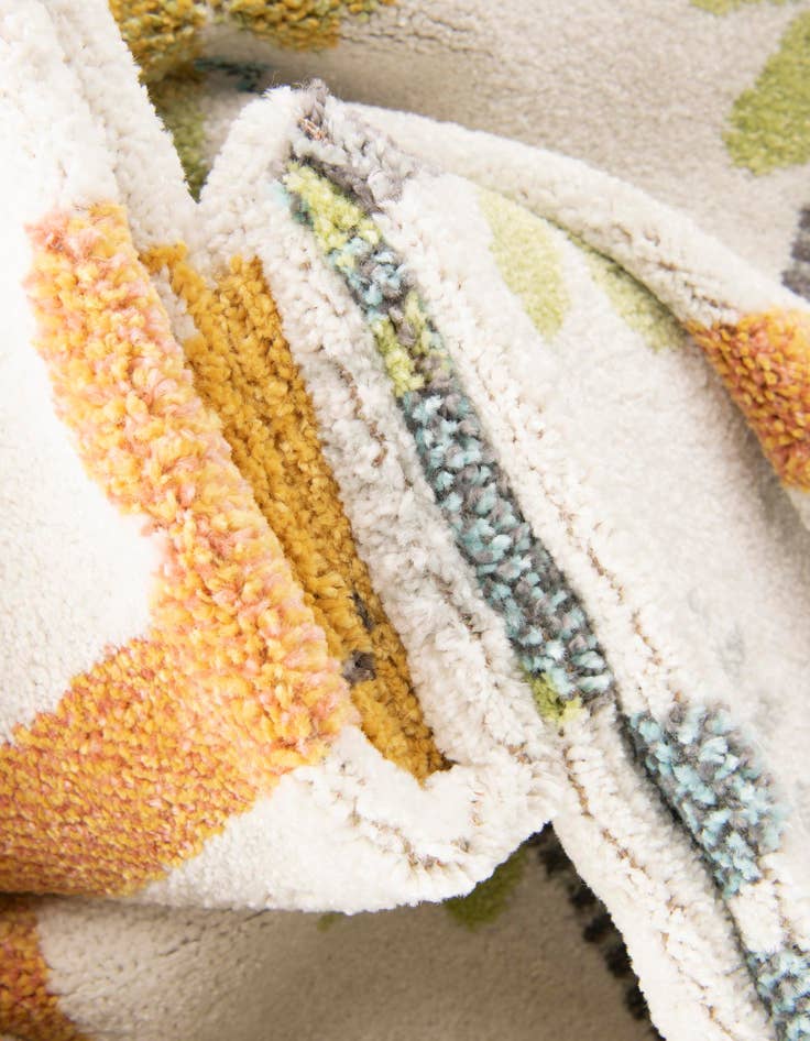 Detail image of 4' 1 x 6' 1 Dinosaur Whimsy Kids Rug