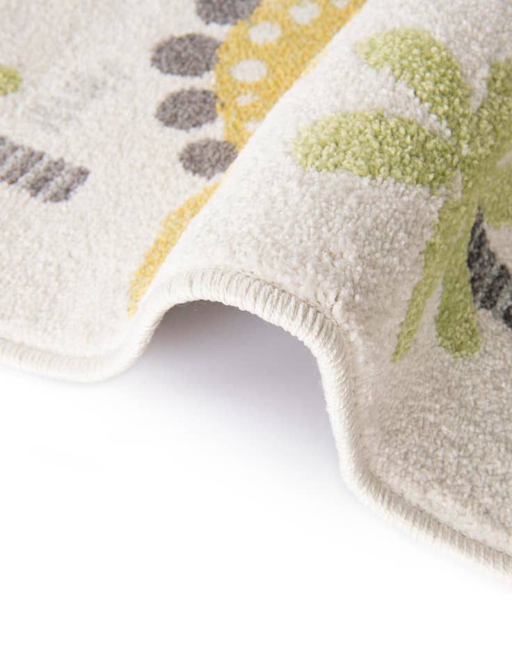 Detail image of 4' 1 x 6' 1 Dinosaur Whimsy Kids Rug