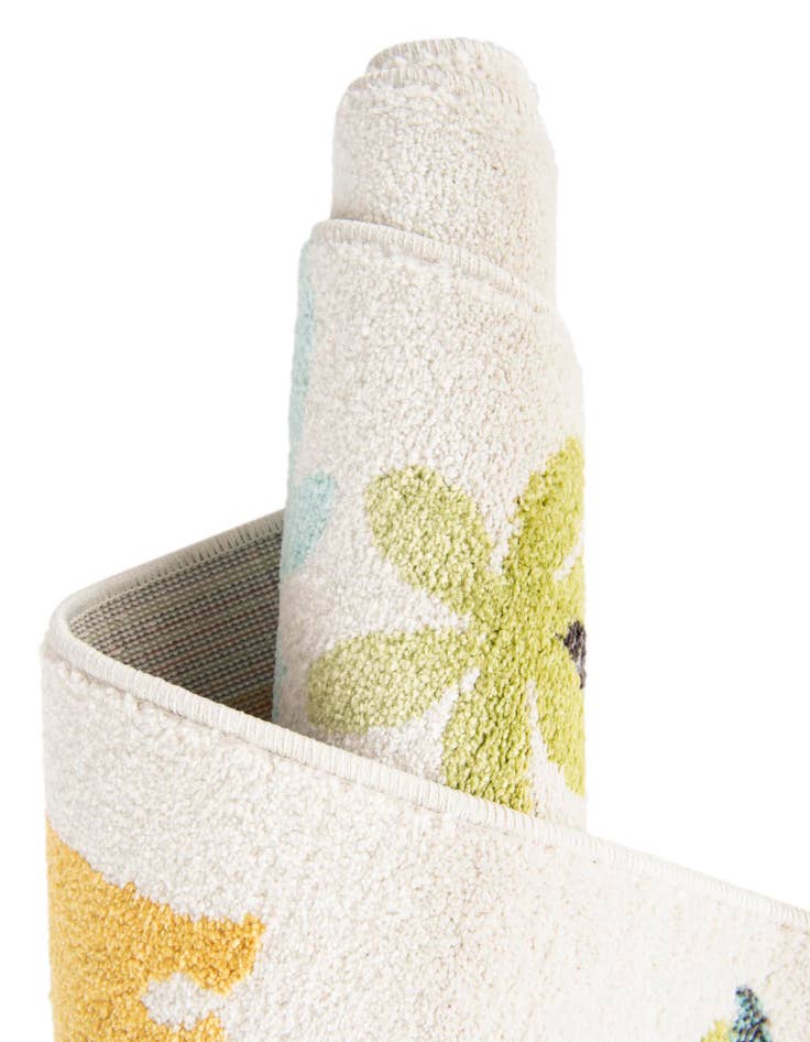 Detail image of 4' 1 x 6' 1 Dinosaur Whimsy Kids Rug