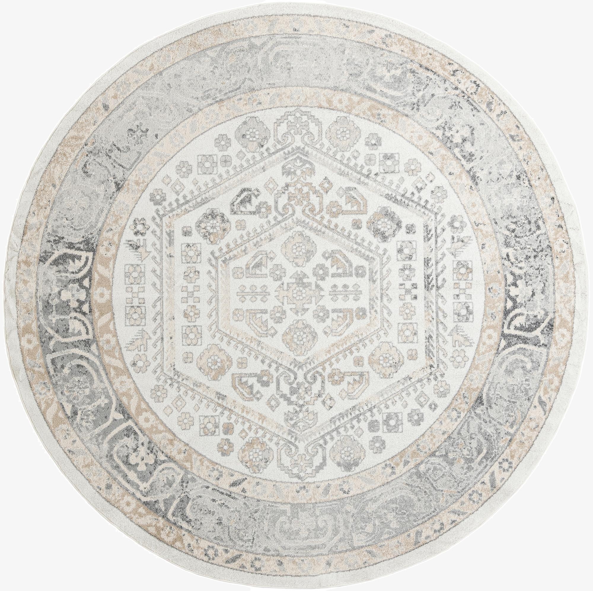 A 10-foot round ivory and cream rug with a distressed traditional medallion and tribal pattern.
