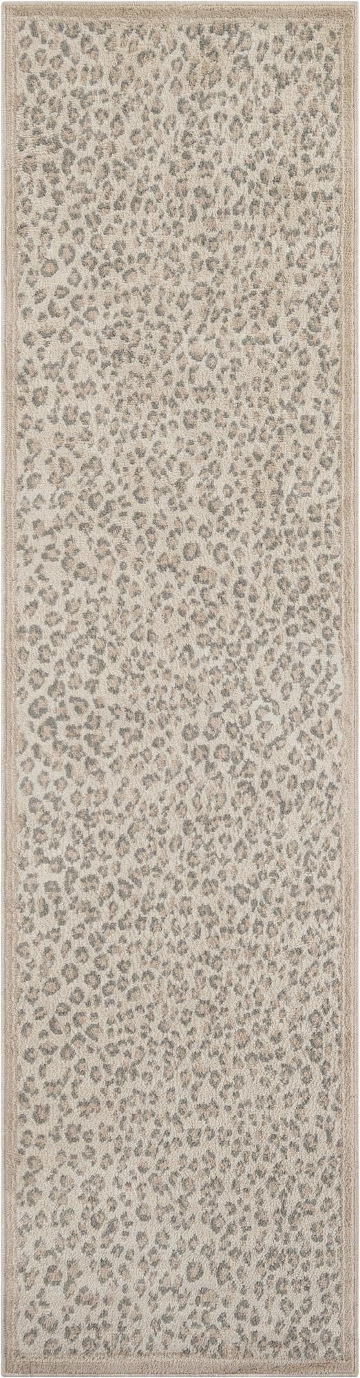 A 10 ft runner rug in a modern ivory and cream leopard print pattern with a medium pile, ideal for hallways.