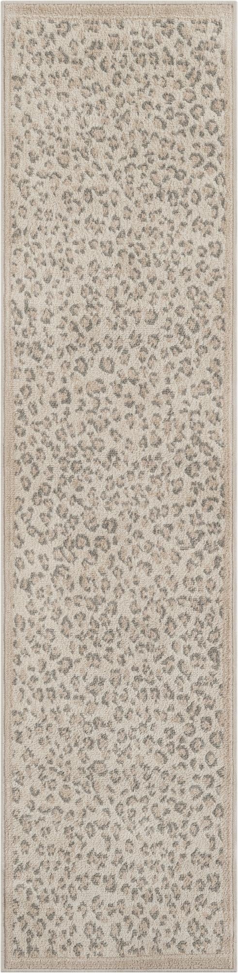 An 8 ft runner rug from the Savannah collection, featuring a modern ivory and cream leopard print pattern, perfect for a hallway or kitchen.