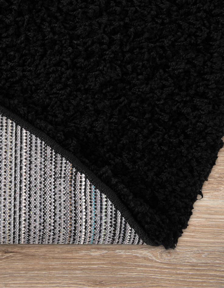 Detail image of 7' 10 x 10' Solid Shag Oval Rug
