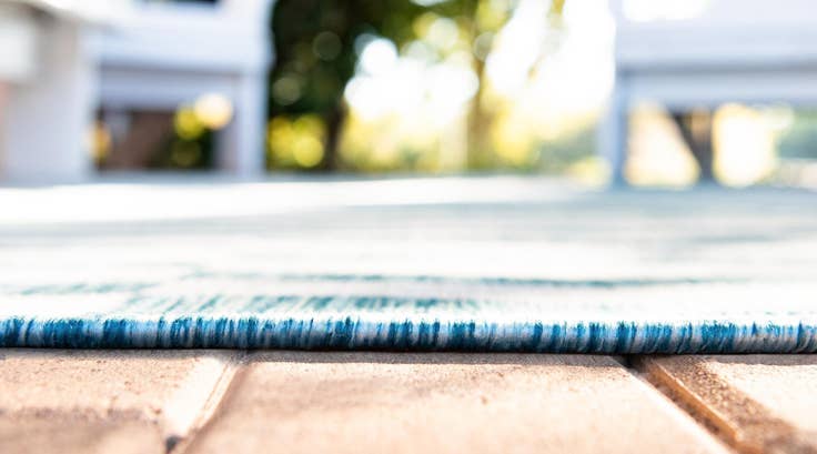 Detail image of 5' 3 x 8' Easy-Clean Striped Indoor / Outdoor Rug