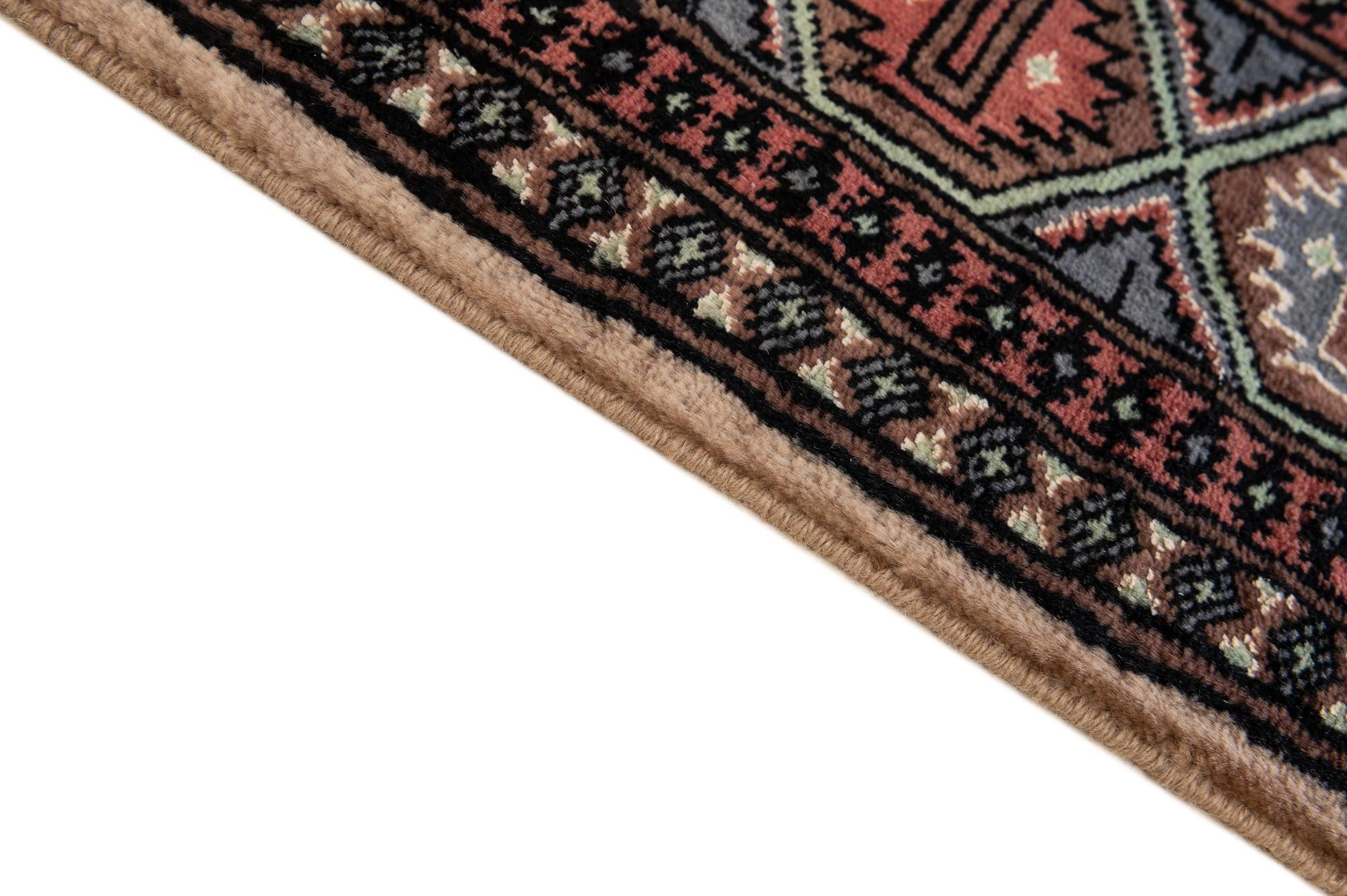 4' x 6' 5 Hand Knotted Bokhara Oriental Rug