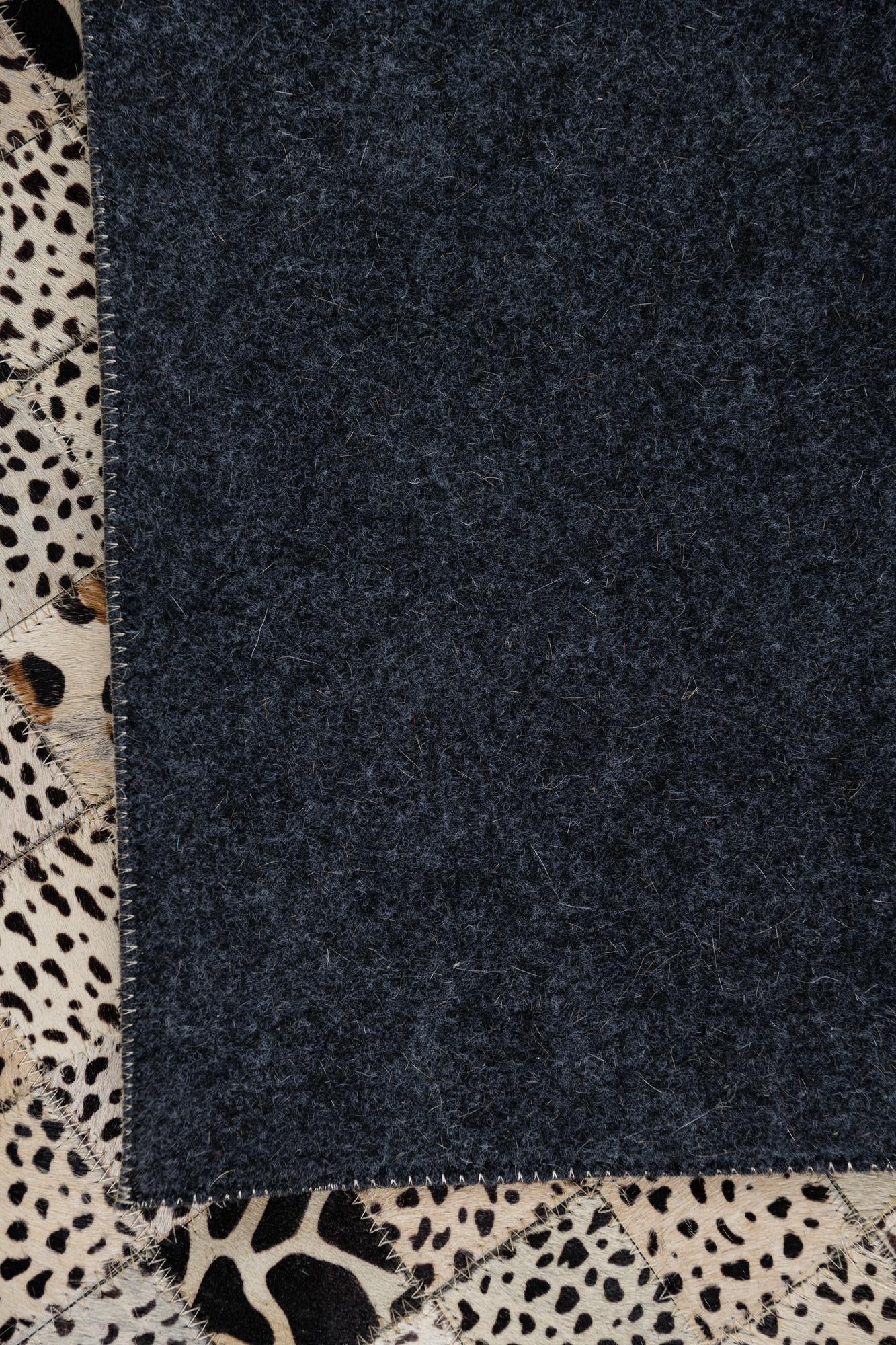 5' 1 x 8' 1 Cowhide Leather Rug