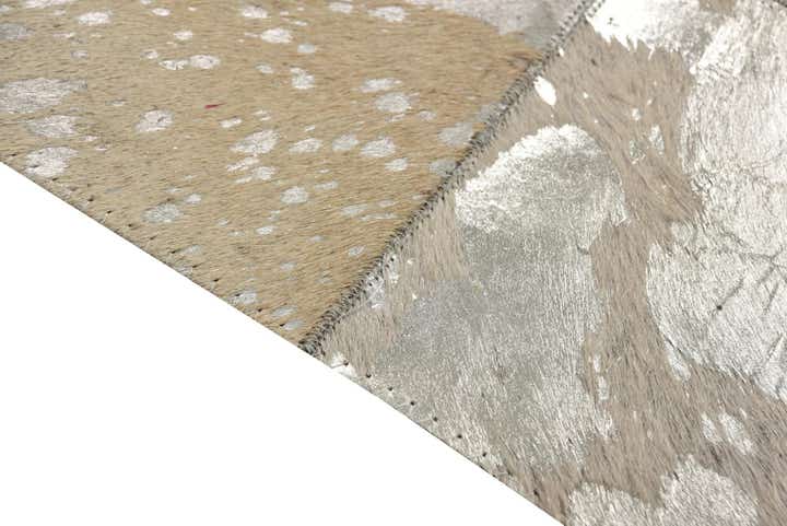 5' 1 x 7' 10 Cowhide Rug