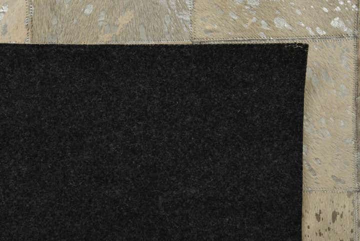 5' 1 x 7' 10 Cowhide Rug