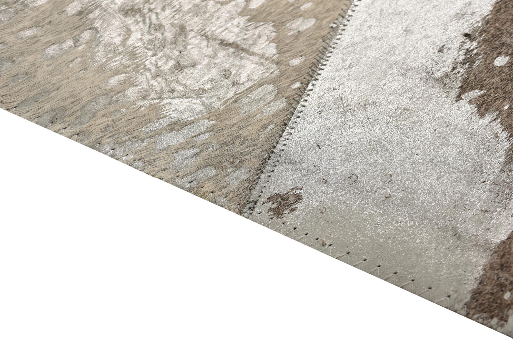 5' 1 x 7' 10 Cowhide Rug