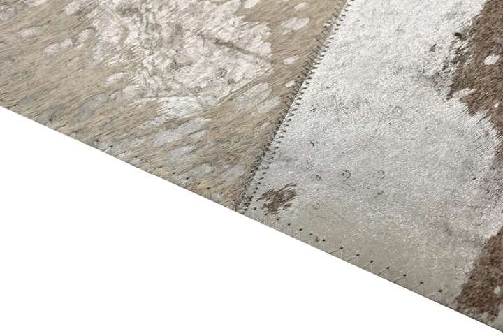 5' 1 x 7' 10 Cowhide Rug