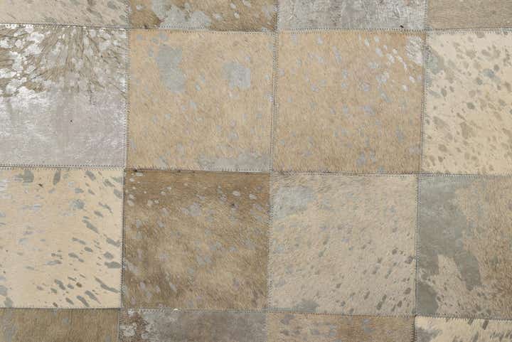5' 1 x 7' 10 Cowhide Rug