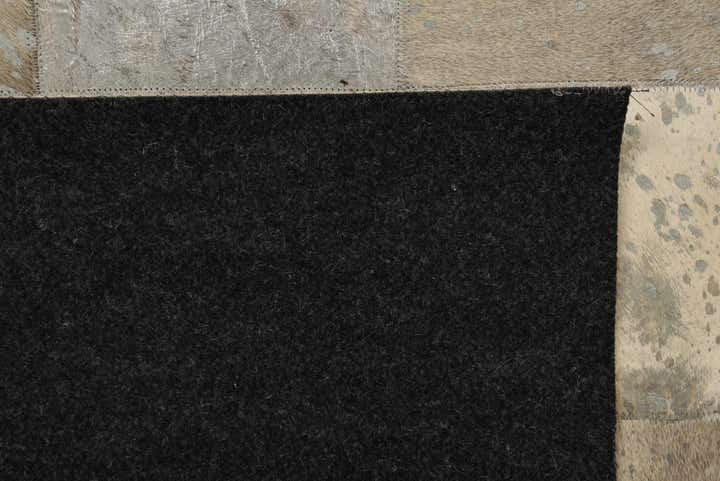 5' 1 x 7' 10 Cowhide Rug