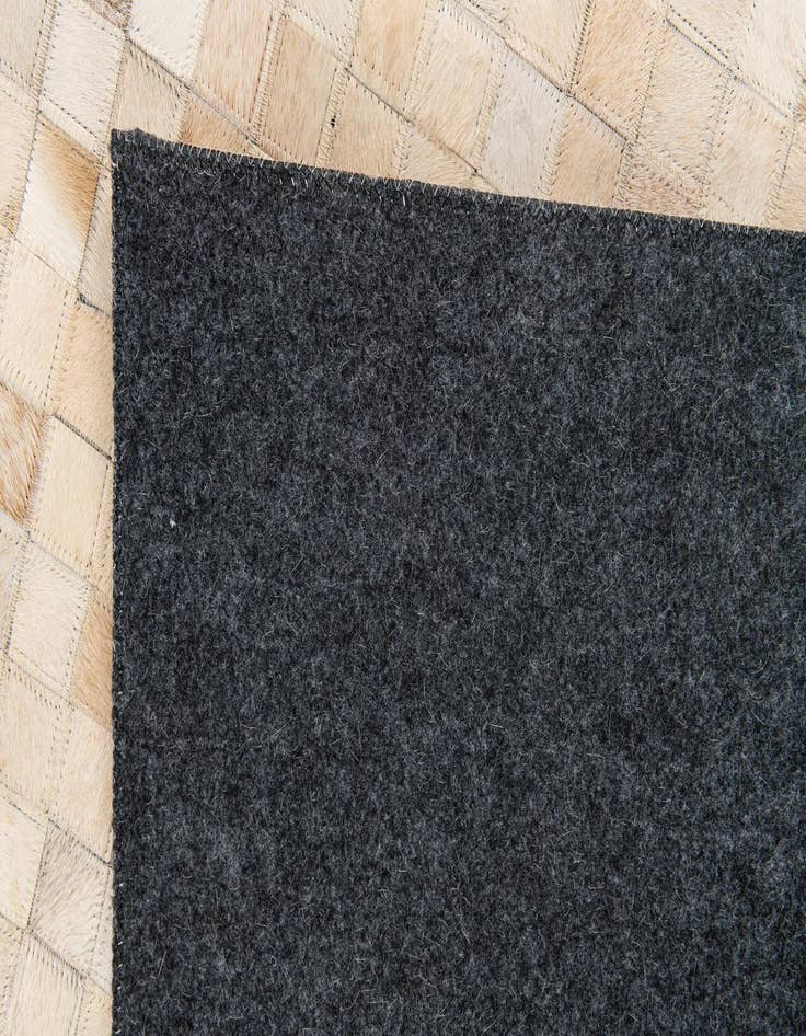 Detail image of 5' 1 x 7' 10 Cowhide Stocks Rug