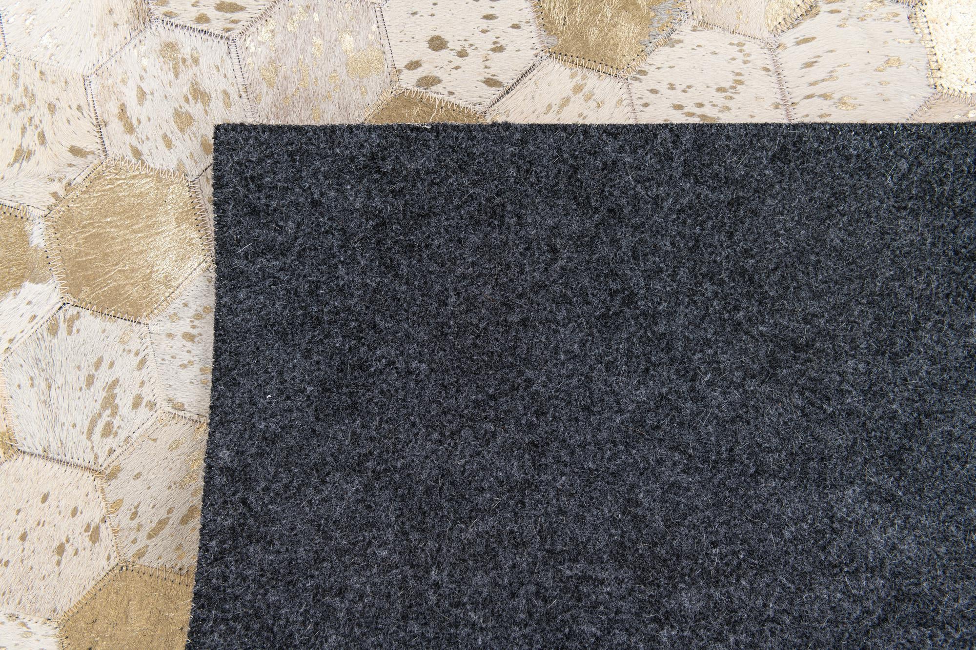 4' 10 x 7' 7 Cowhide Stocks Rug
