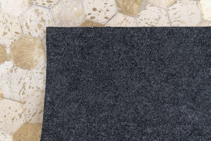 4' 10 x 7' 7 Cowhide Stocks Rug