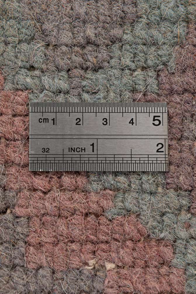 3' 11 x 5' 10 Hand Knotted Nepal Wool Rug