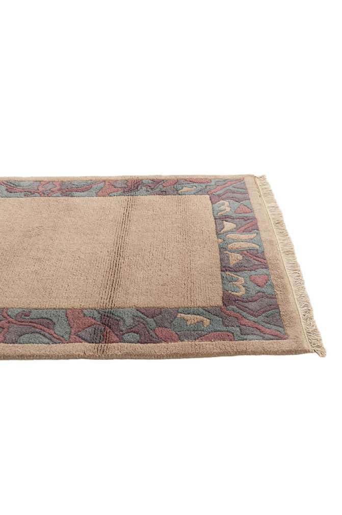 3' 11 x 5' 10 Hand Knotted Nepal Wool Rug