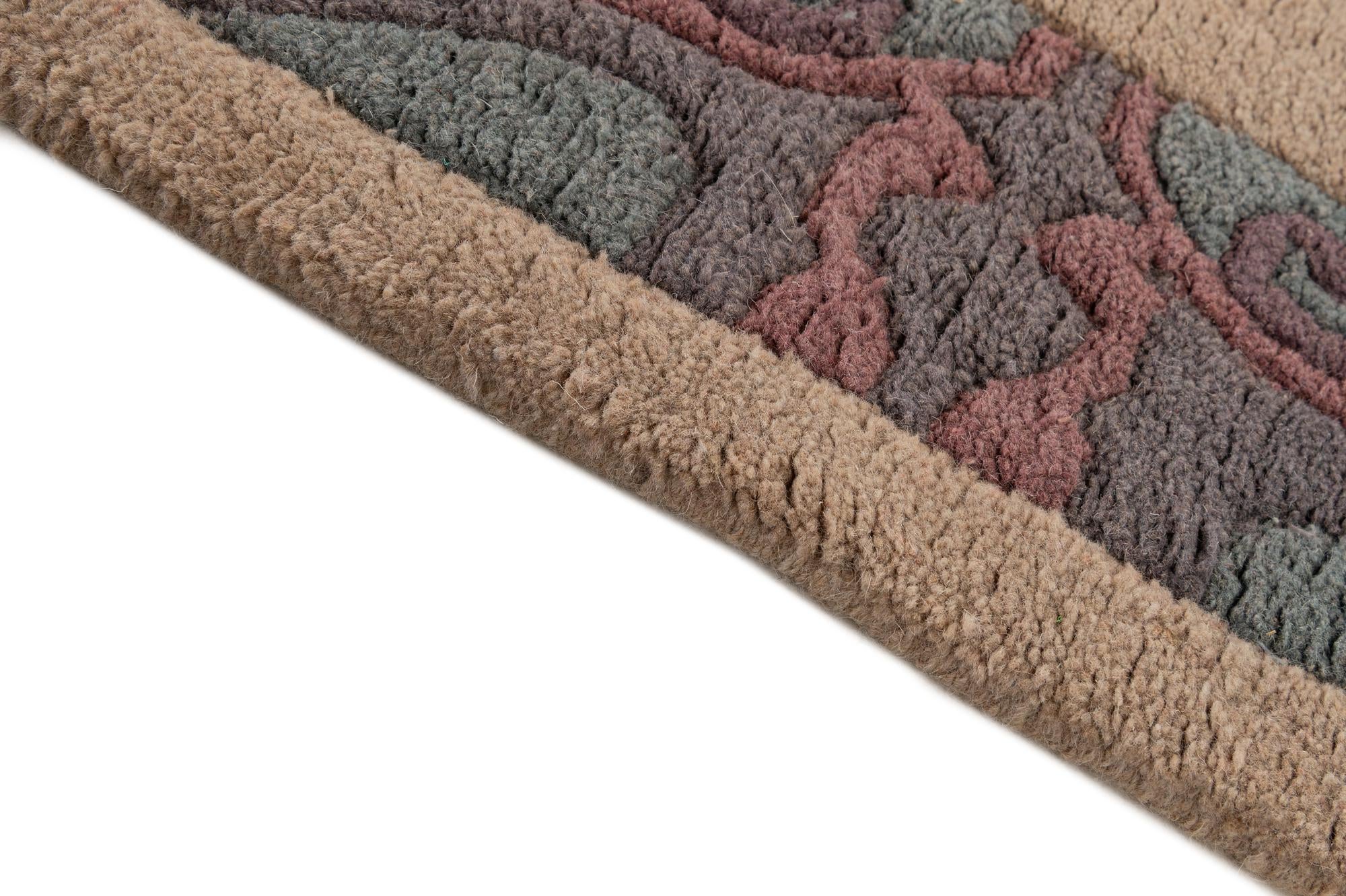 3' 11 x 5' 10 Hand Knotted Nepal Wool Rug
