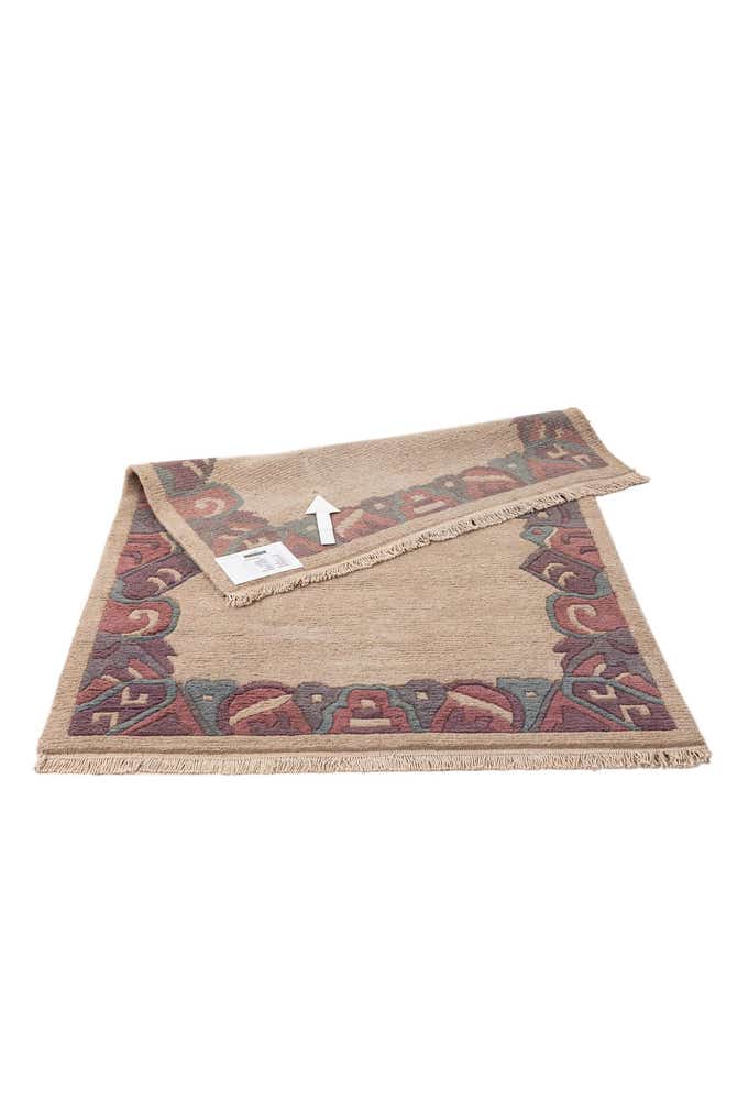 4' x 5' 10 Hand Knotted Tibet Wool Rug