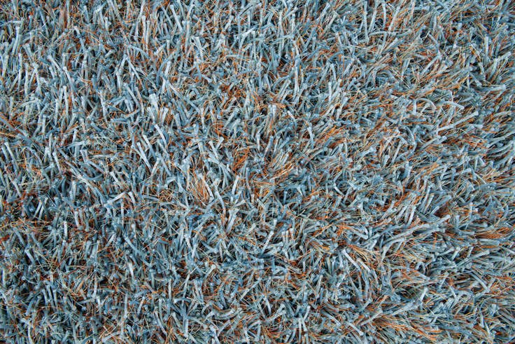 Detail image of 5' x 6' 7 Hand Woven Two-Tone Shag Rug