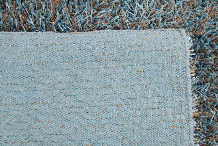 Detail image of 5' x 6' 7 Hand Woven Two-Tone Shag Rug