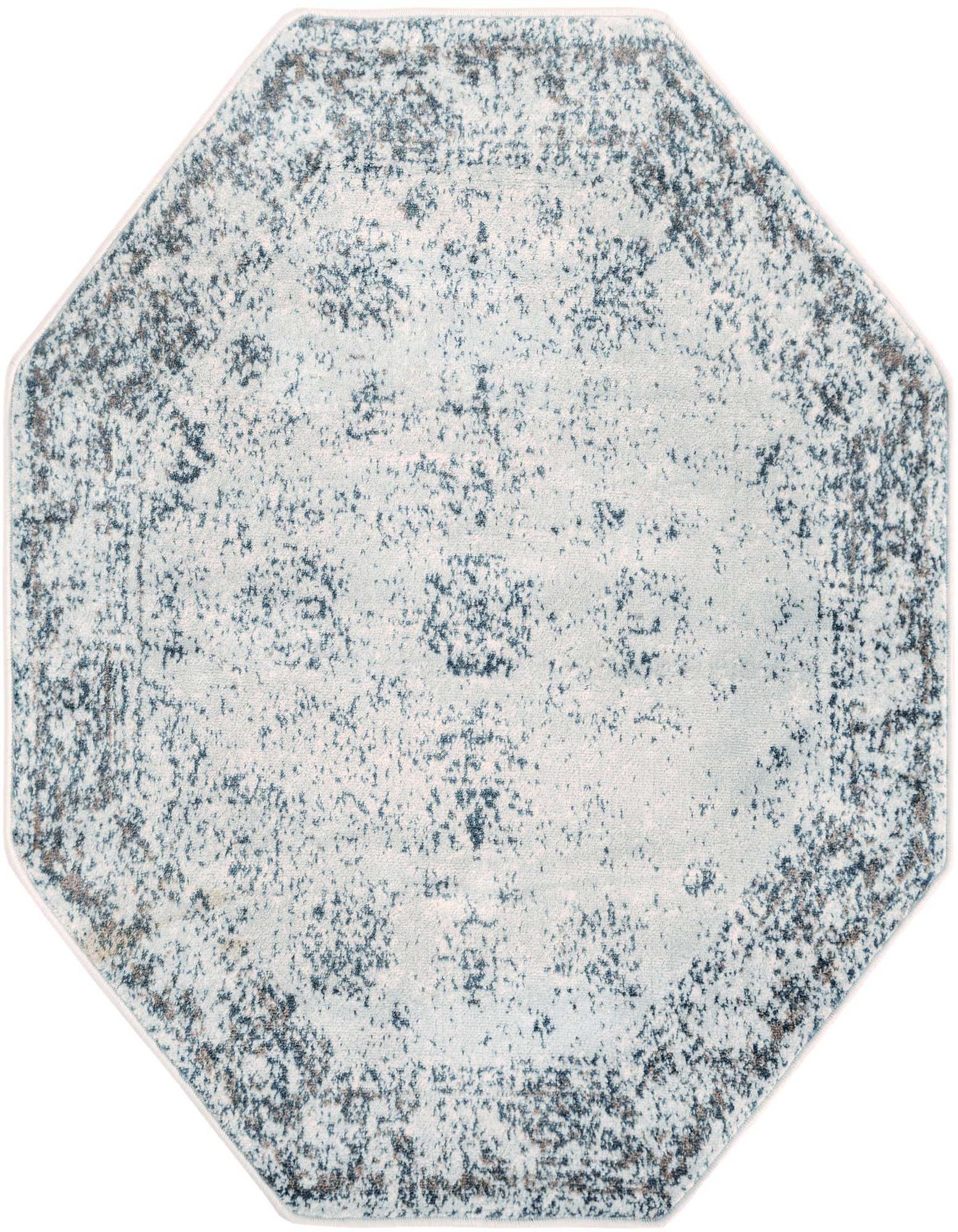 An octagon-shaped Monte Carlo rug by Rugs.com, featuring a faded blue and white transitional medallion pattern.