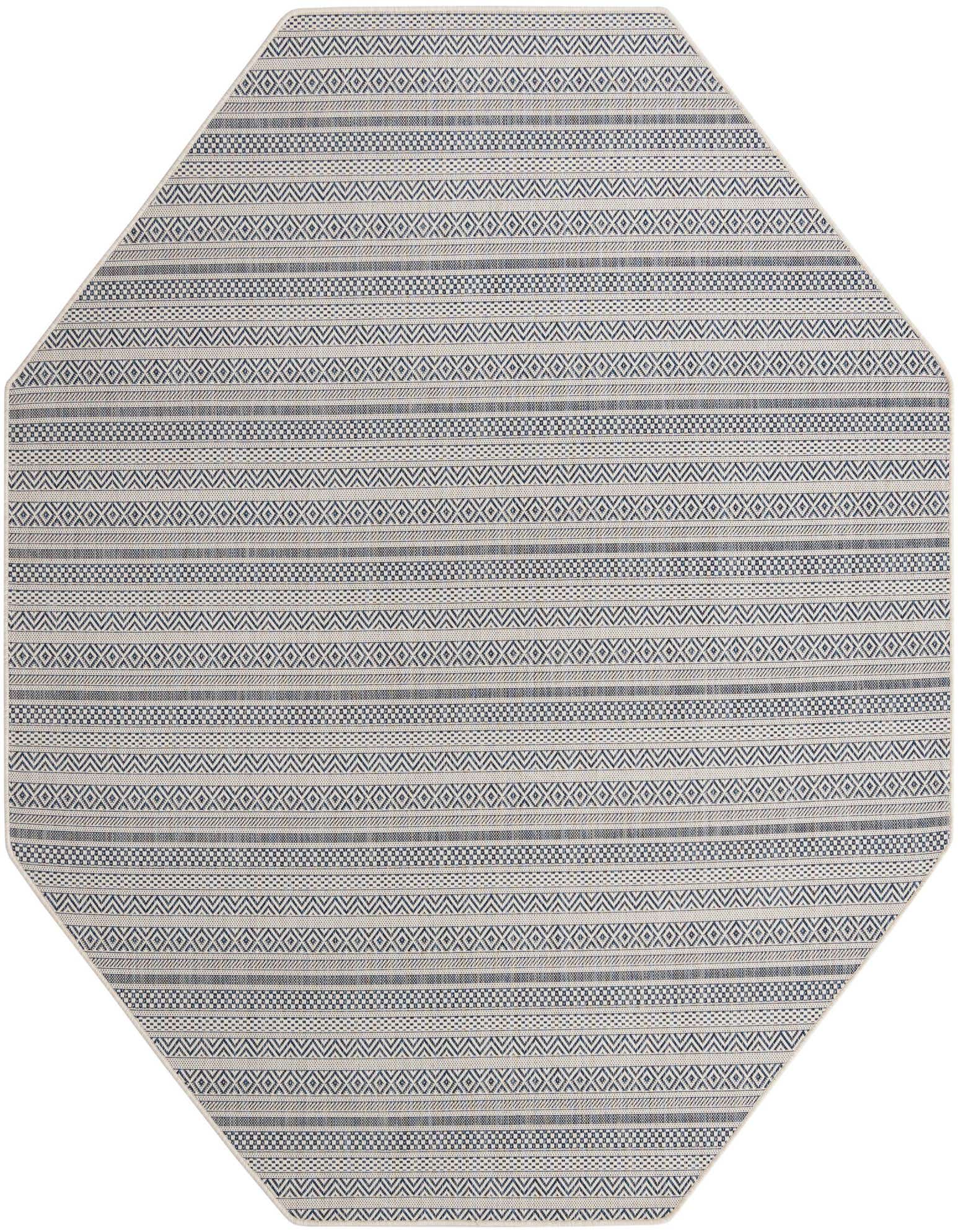 Octagon-shaped indoor/outdoor rug with a tribal and modern striped pattern in shades of blue and cream.