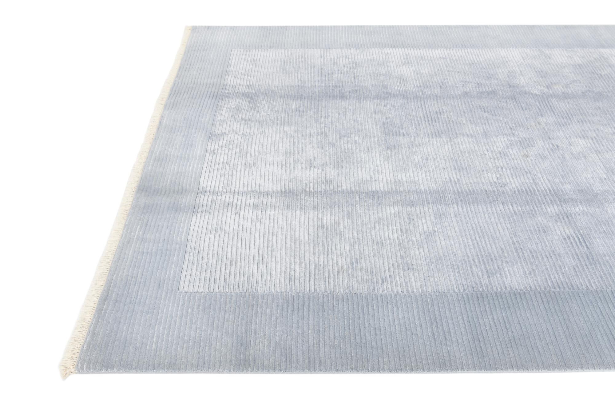 6' 7 x 10' Hand Knotted Darya Wool Rug